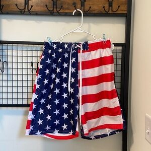 NWOT | Uzzy men’s American‎ flag swim trunks — small